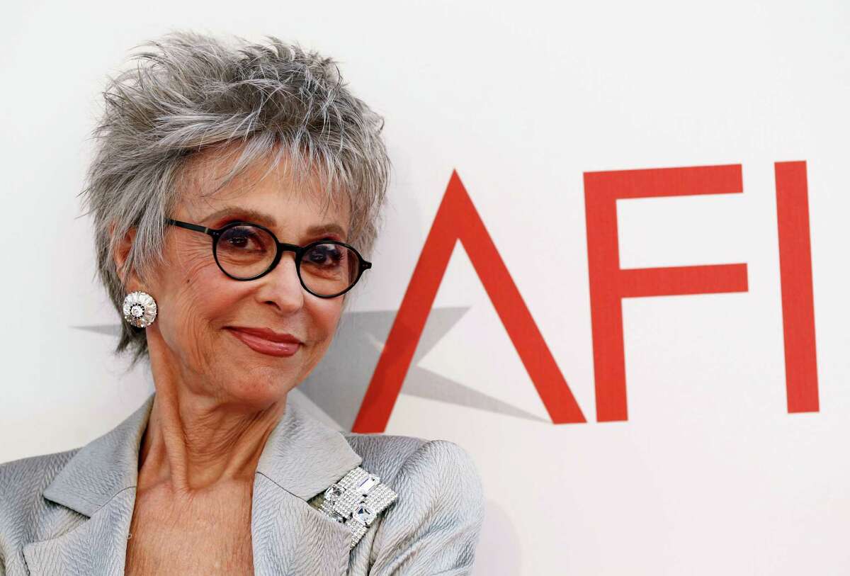 FILE - In this June 9, 2011 file photo, Puerto Rican actress and singer Rita Moreno arrives at the taping of "TV Land Presents: AFI Life Achievement Award Honoring Morgan Freeman" in Culver City, Calif. Moreno has won an Academy Award, an Emmy, a Tony, a Grammy and received The National Medal of Arts by U.S. President Barack Obama. (AP Photo/Matt Sayles, file)