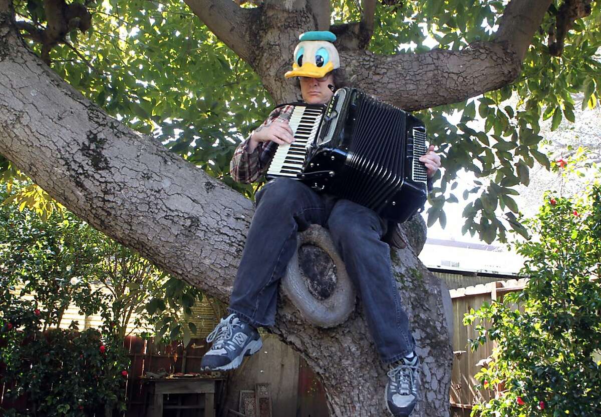 Aaron Seeman, aka Duckmandu is an Oakland accordionist and singer whose repertoire encompasses everything from classical, Broadway, Sousa Marches as well as Polkas to Rock Tuesday, March 12, 2013, in Alameda Calif.