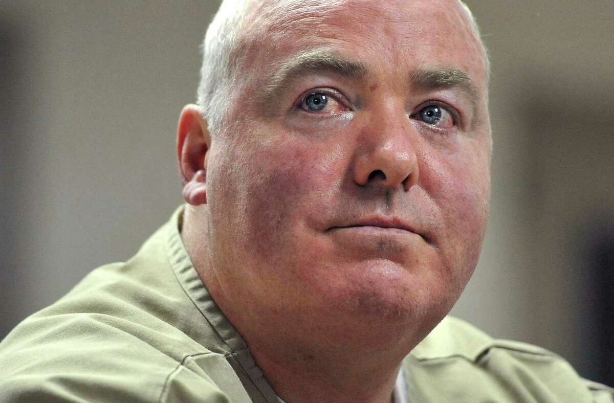 In this Oct. 24, 2012, file photo, Michael Skakel listens during a parole hearing at McDougall-Walker Correctional Institution in Suffield, Conn. Prosecutors want a judge to dismiss Michael Skakel's latest challenge of his 2002 murder conviction, saying the Kennedy cousin's claim that his trial attorney did a poor job should have been raised in an earlier appeal and that many of the issues he cites were previously rejected, Wednesday, Feb. 13, 2013. (AP Photo/Jessica Hill, Pool, File)