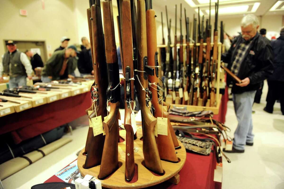 Rifles for sale during the Arms Fair on Saturday, March 16, 2013, at the City Center in Saratoga Springs, N.Y. The New Eastcoast Arms Collectors Associates sponsored the event. (Cindy Schultz / Times Union)