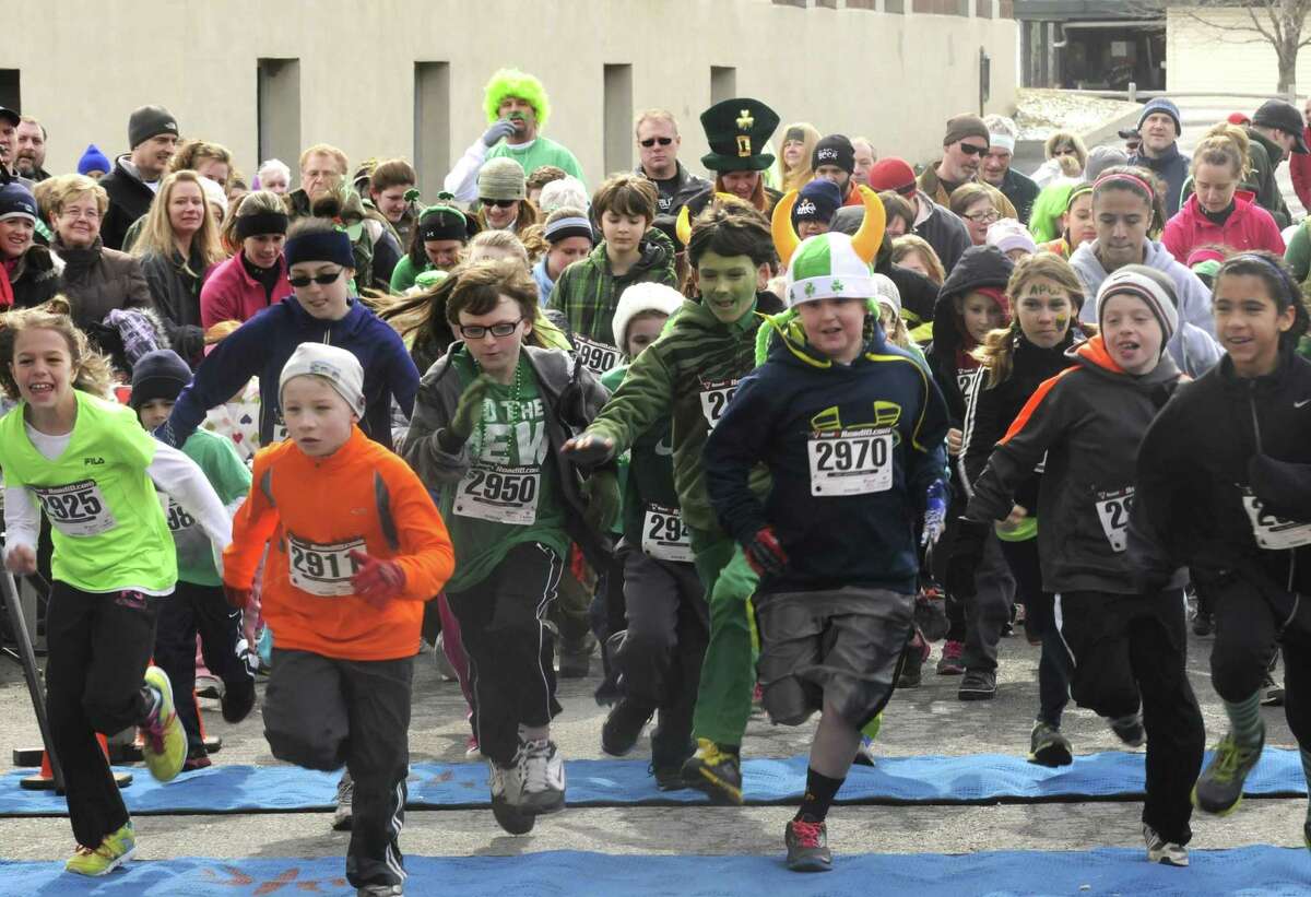 Children break fro the start of the kids run as part of the 2 Annual Great Kilt Race on Saturday March 16, 2013 in Averill Park, N.Y. (Michael P. Farrell/Times Union)