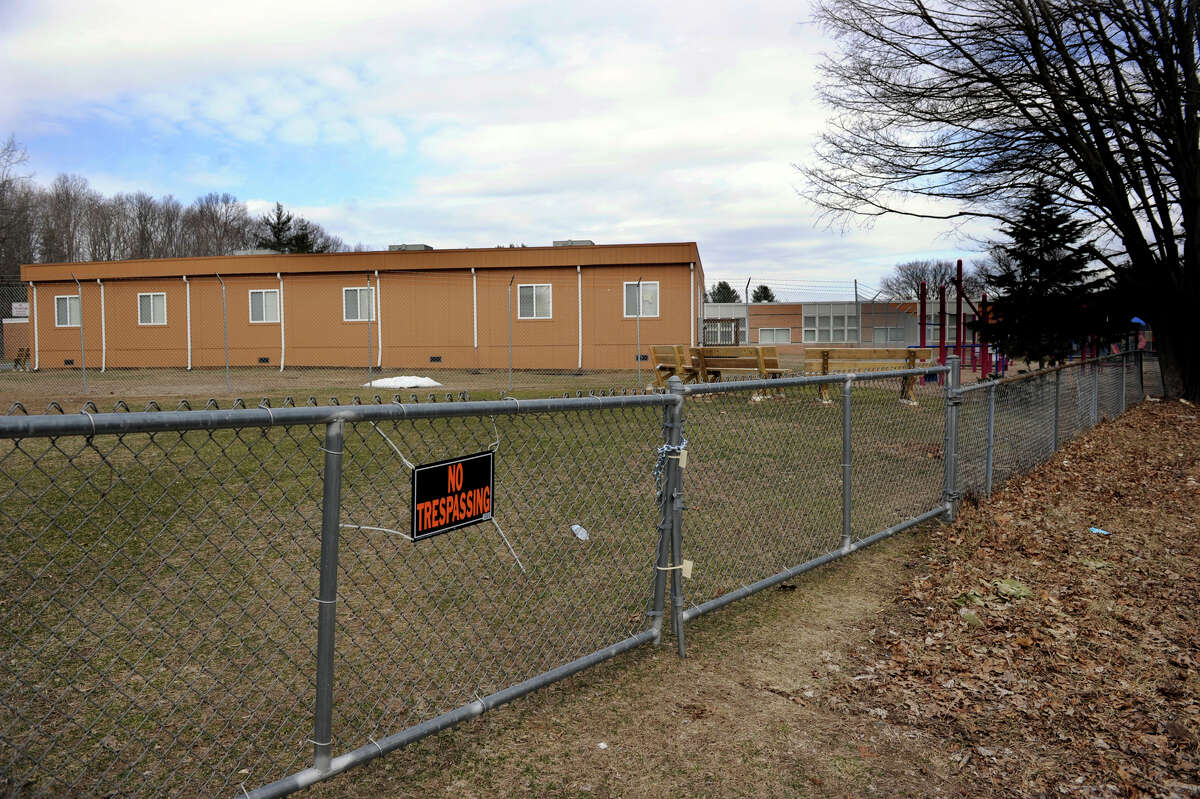 The Sandy Hook Elementary School is viewed from the playground area, Friday, March 15, 2013.