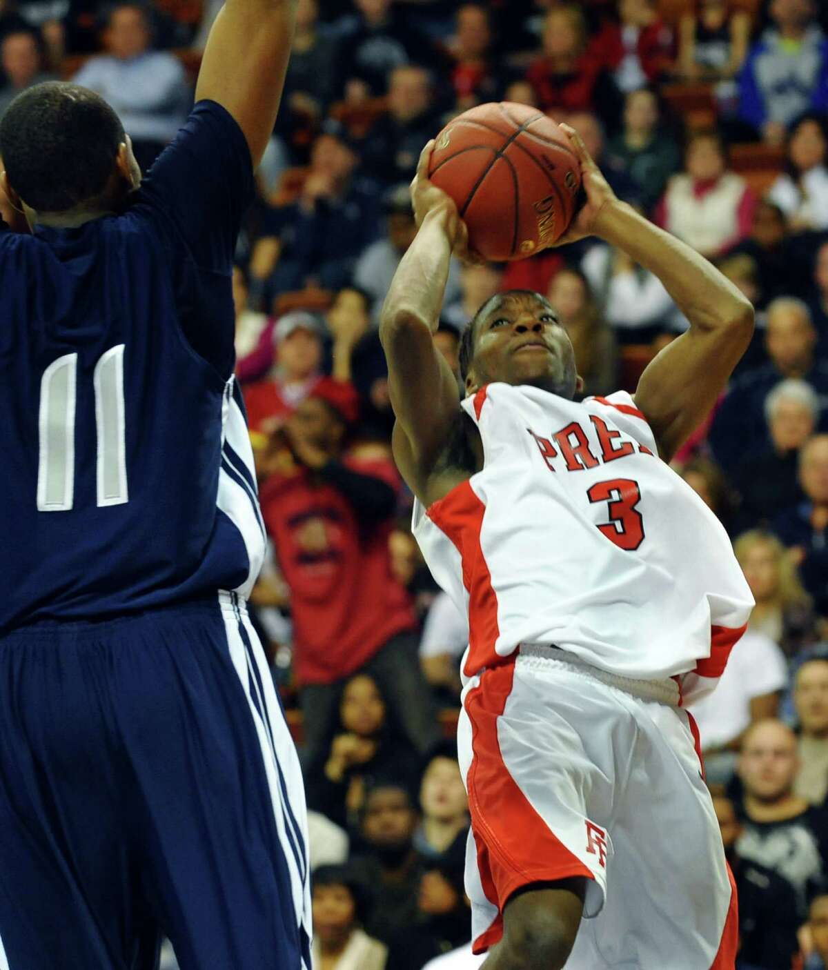 Fairfield Prep's #3 Keith Pettway looks for two points, during Class LL boys basketball final action against Hillhouse in Uncasville, Conn. on Saturday March 16, 2013.