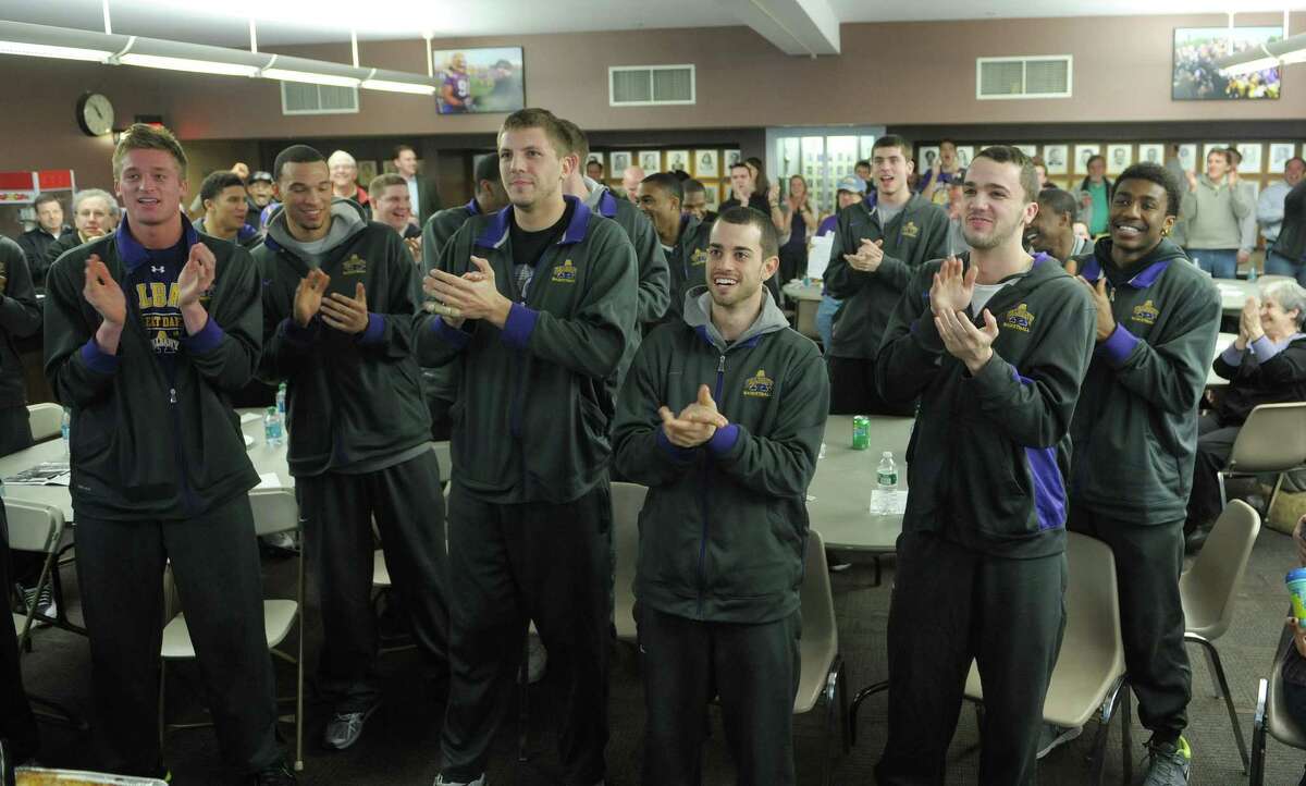 University at Albany men's basketball players, from left to right, Dave Wiegmann, Gary Johnson, Blake Metcalf, Jacob Lati, Peter Hooley and Reece Williams XXX at they watch the NCAA selection show on Sunday, March 17, 2013 at the SEFCU Arena in Albany, NY. (Paul Buckowski / Times Union)