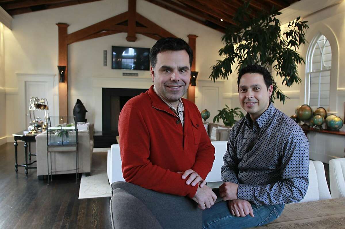 Joe Marko (left) and Rafael Acevedo are seen in the 1,100 sq. ft. living room of their home, which was at one time a church and then a synagogue, in San Francisco, Calif. on Saturday, Dec. 29, 2012.