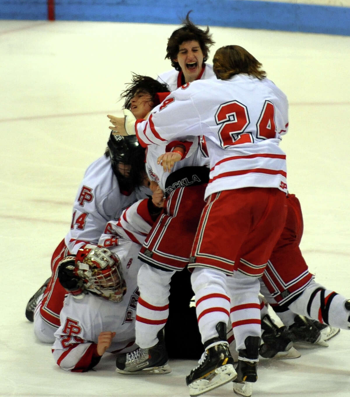 Fairfield Prep celebrates its win over Notre Dame of West Haven after CIAC Division I boys hockey final action at Ingalls Rink in New Haven, Conn. on March 19, 2013.