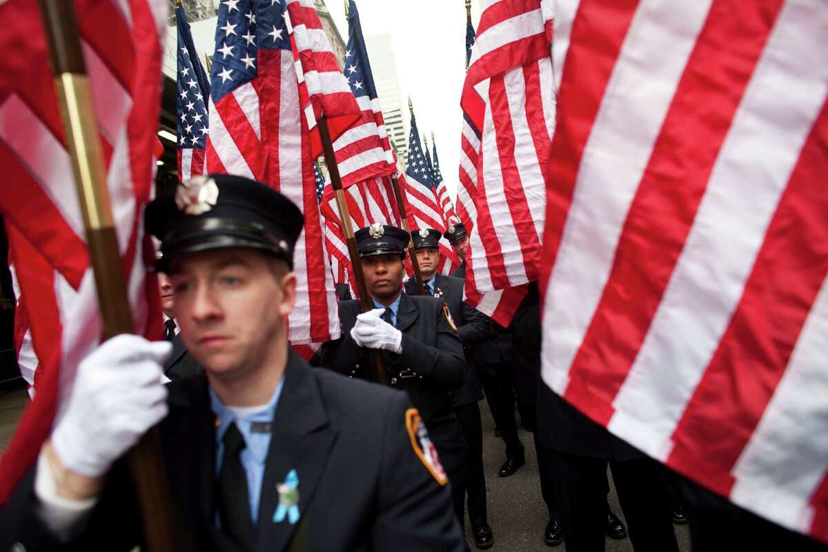 NEW YORK, NY - MARCH 16: Members of FDNY march on Fifth Avenue during the 252nd annual St. Patrick's Day Parade March 16, 2013 in New York City. The parade honors the patron saint of Ireland and was held for the first time in New York on March 17, 1762, 14 years before the signing of the Declaration of Independence.