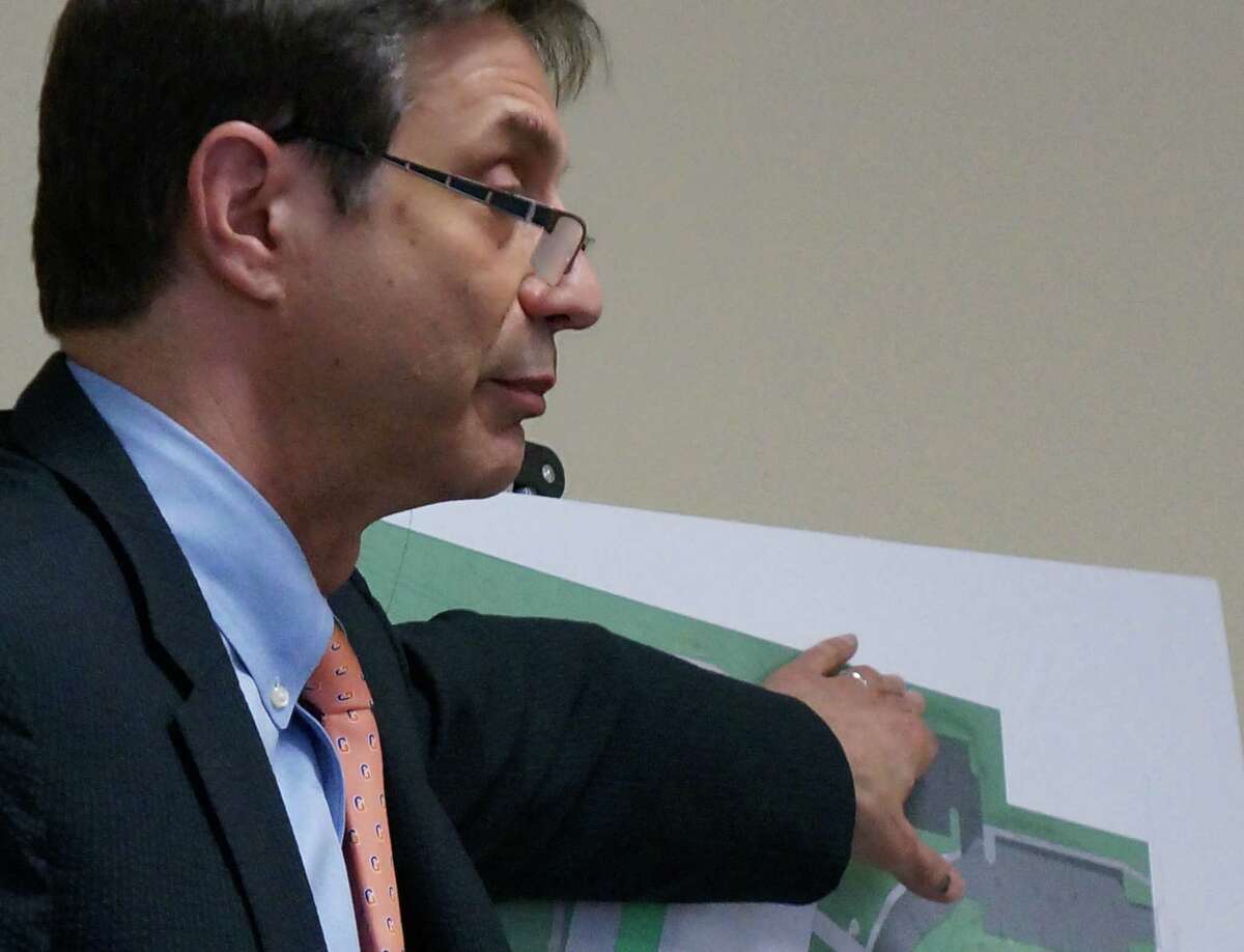 Architect Kenneth Boroson reviews plans for the renovation and expansion of Riverfield School at Wednesday's Board of Selectmen meeting. FAIRFIELD CITIZEN, CT 3/20/13