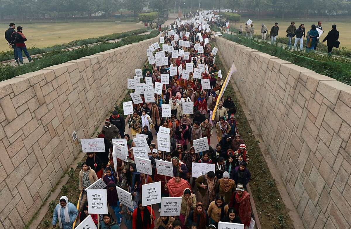 In this photograph taken on January 2, 2013, Indian women hold placards during the Women Dignity march in New Delhi, following the December 2012 fatal gang-rape of a student in the capital. India's upper house on March 21, 2013, gave its seal of approval to a new bill toughening punishment for sex offenders, including the death penalty if a victim dies. AFP PHOTO/ Prakash SINGH/FILESPRAKASH SINGH/AFP/Getty Images