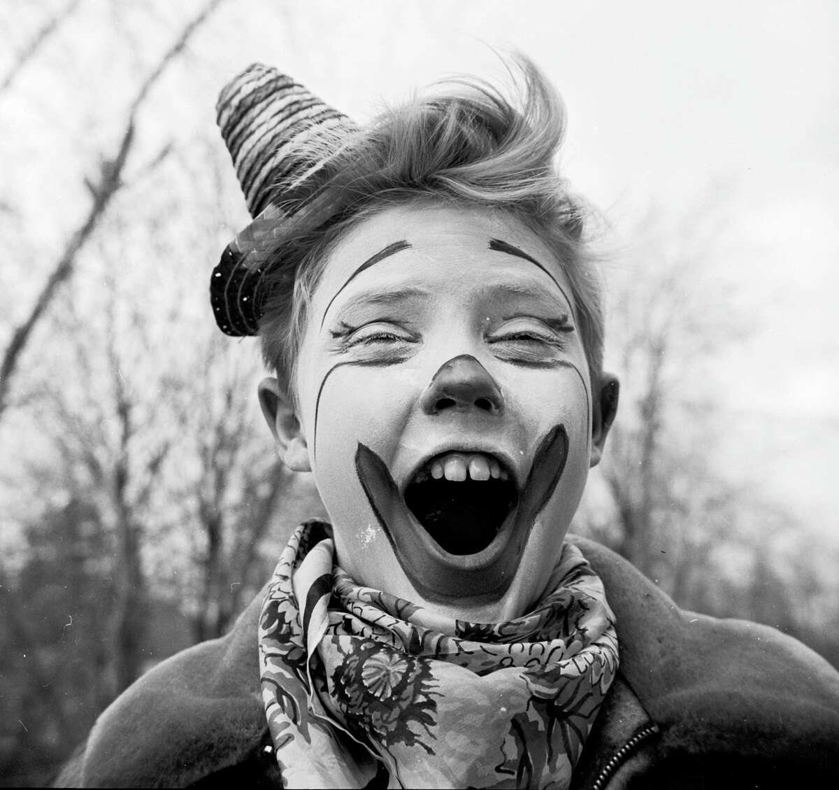 Circa 1955: Young clown Ronnie Walken, later film star Christopher Walken, pulls a face for the camera.