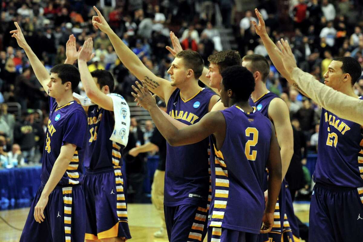 UAlbany's basketball team salutes their fans when they lose 73-61 to Duke in the second round NCAA Tournament on Friday, March 22, 2013, at Wells Fargo Center in Philadelphia, Penn. (Cindy Schultz / Times Union)