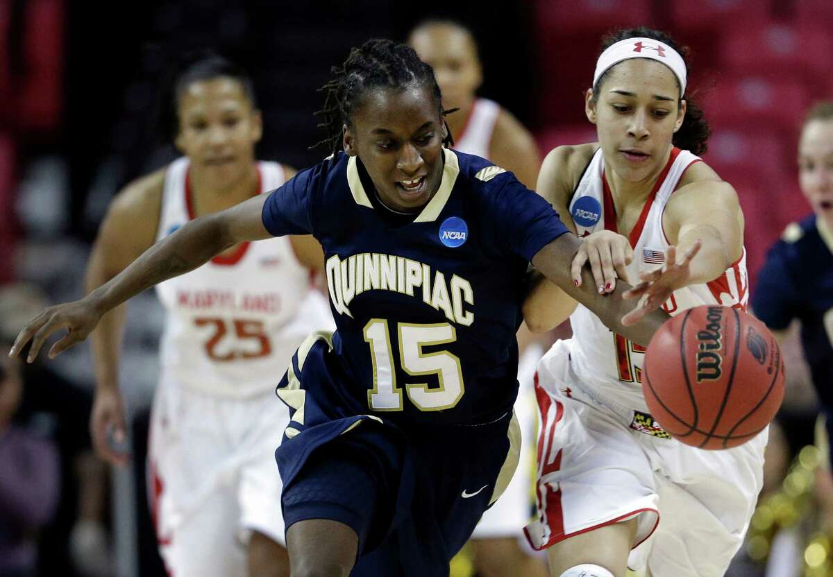 Quinnipiac guard Felicia Barron (15) and Maryland guard Chloe Pavlech chase after a loose ball during the first half of a first-round game in the women's NCAA college basketball tournament in College Park, Md., Saturday, March 23, 2013.