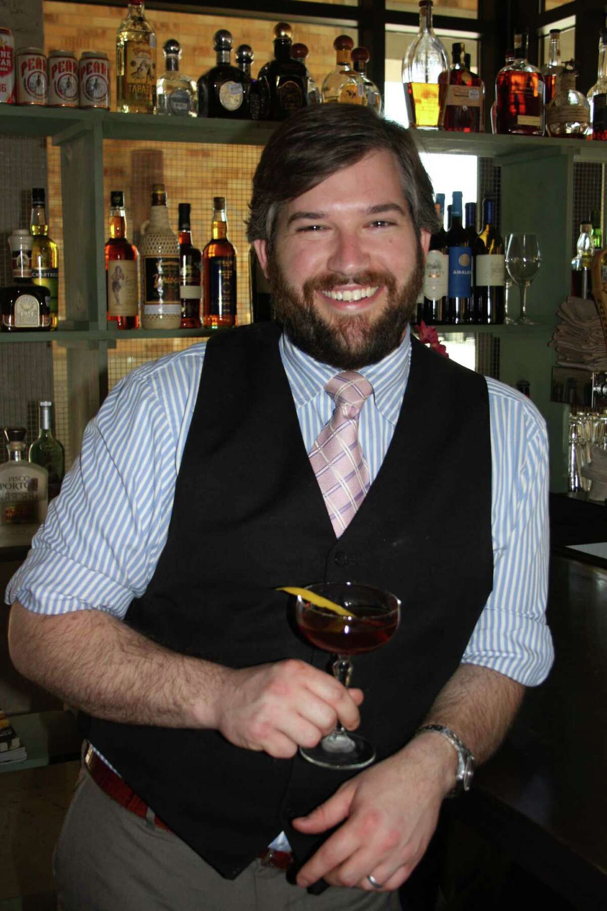 For Confessions of a Bartender: Chris Ware is the bar manager at Arcade Midtown Kitchen at Pearl. (Jennifer McInnis)