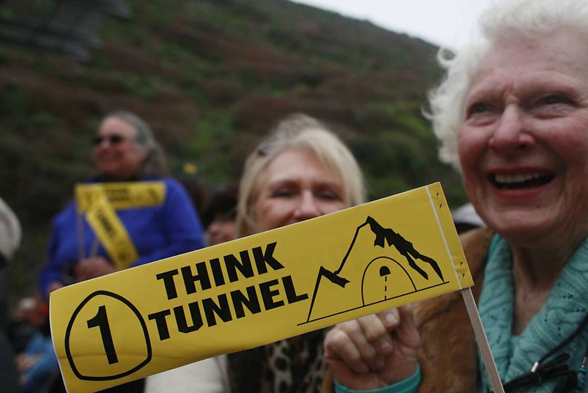 Jan Sweyer and Helen Sweyer, of Woodside, show their support at the grand opening of the Devils Slide tunnel on Monday March 25, 2013 in Montara, Calif.