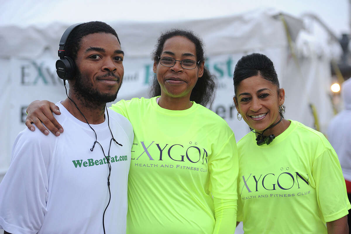 Willie Gillis, Angela Gillis and Lisha Chambers just before running the 2013 Gusher 5k. Angela said she is training to run a marathon. Photo taken March, 09, 2013 Guiseppe Barranco/The Enterprise