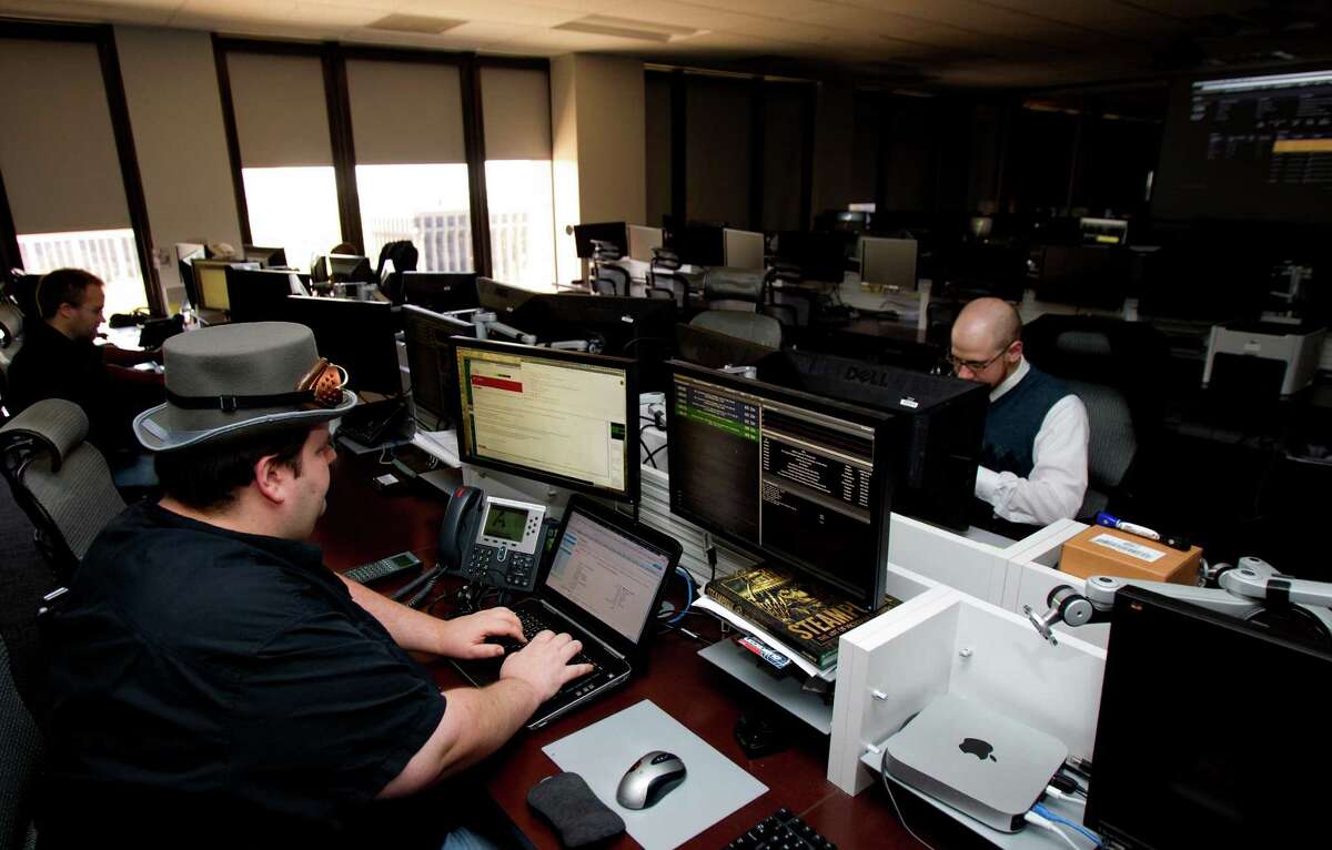 Alert Logic Senior Network Security Analyst Stuart Dunsmore looks for security threats inside the company's security operations center, Monday, March 25, 2013, in Houston. The Houston-based network security company manages online threats of their Security-as-a-Service in the cloud for different entities. (Cody Duty / Houston Chronicle)