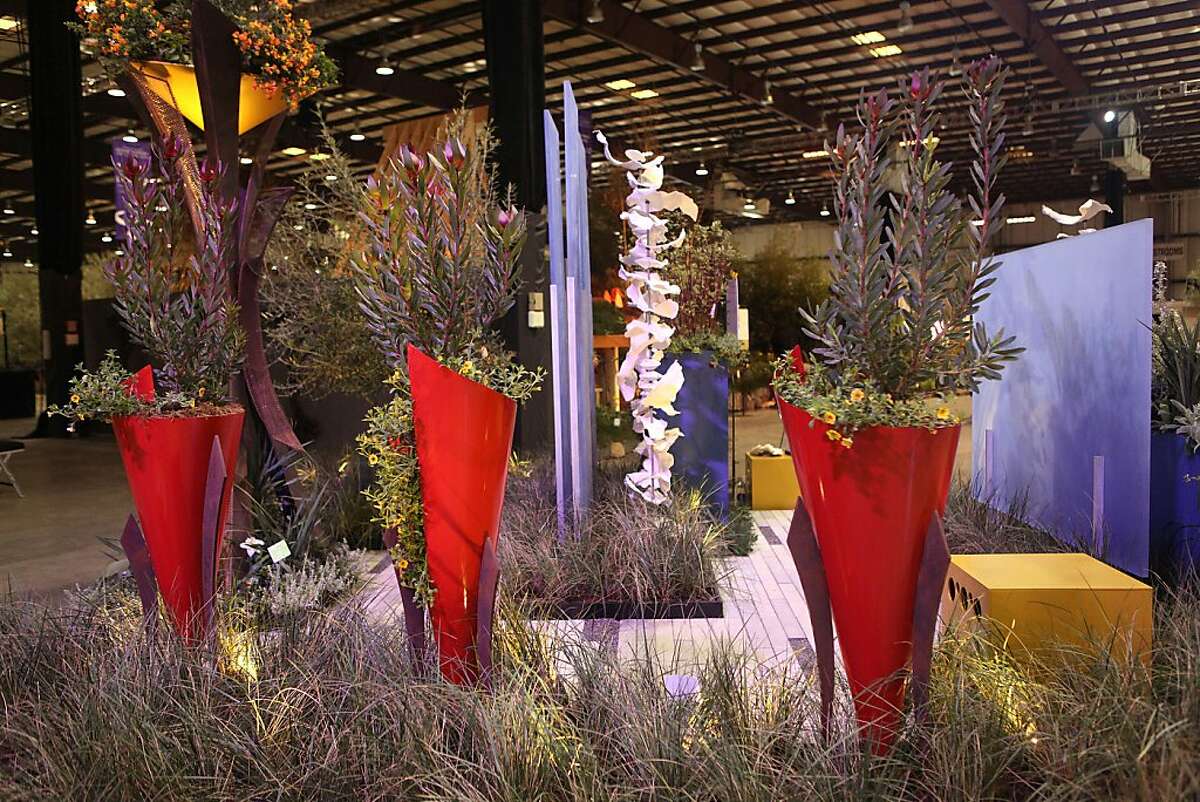 Furl planters in the Wonderland garden designed by Arterra Landscape architects displayed in the San Francisco Flower & Garden Show at the San Mateo event center in California on Thursday, March 21, 2013.