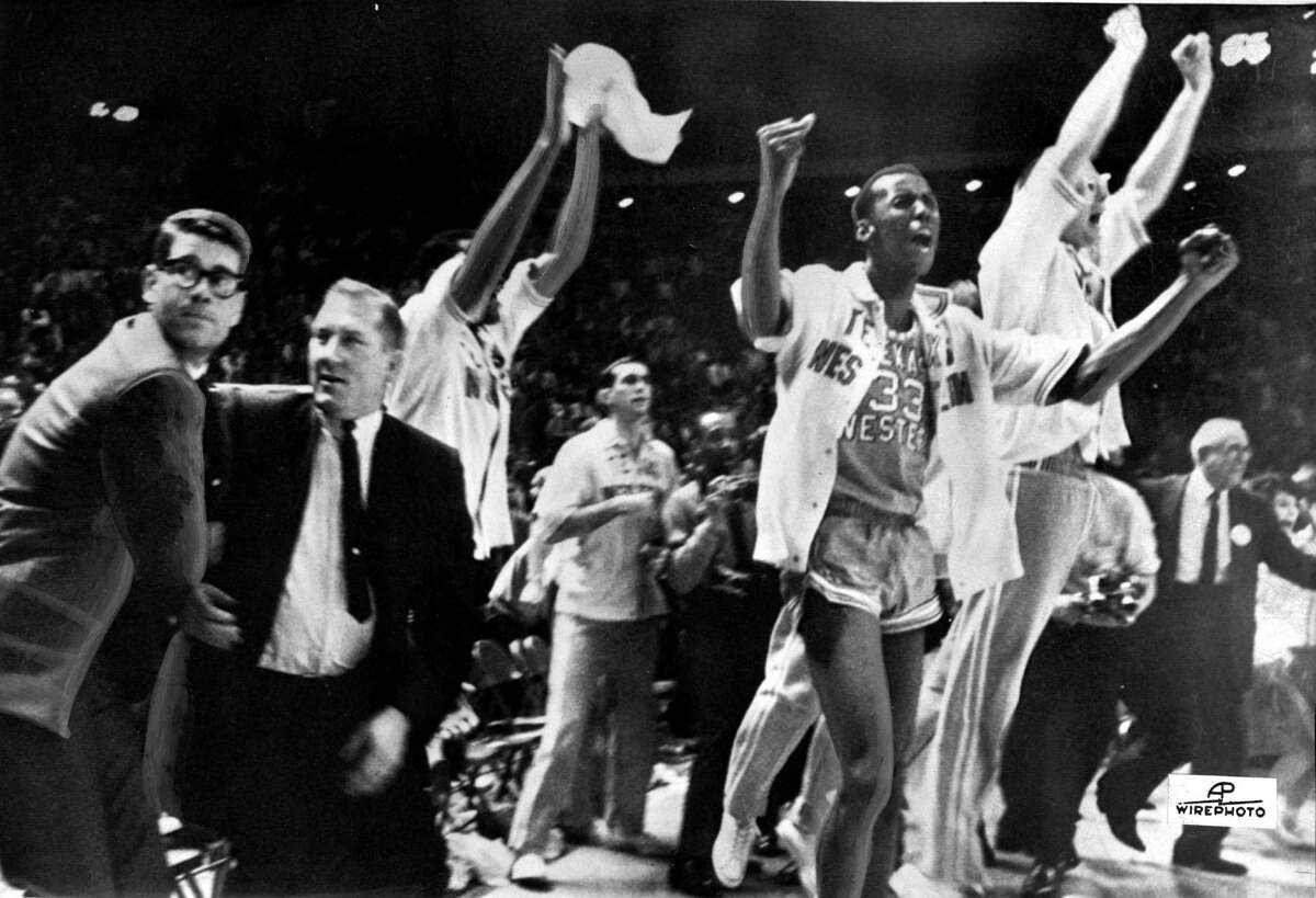 1. 1966 Texas Western: Texas Western coach Don Haskins (second from left) and players celebrate after defeating Kentucky 72-65 to win the 1966 NCAA basketball championship, on March 19, 1966, in College Park, Md.