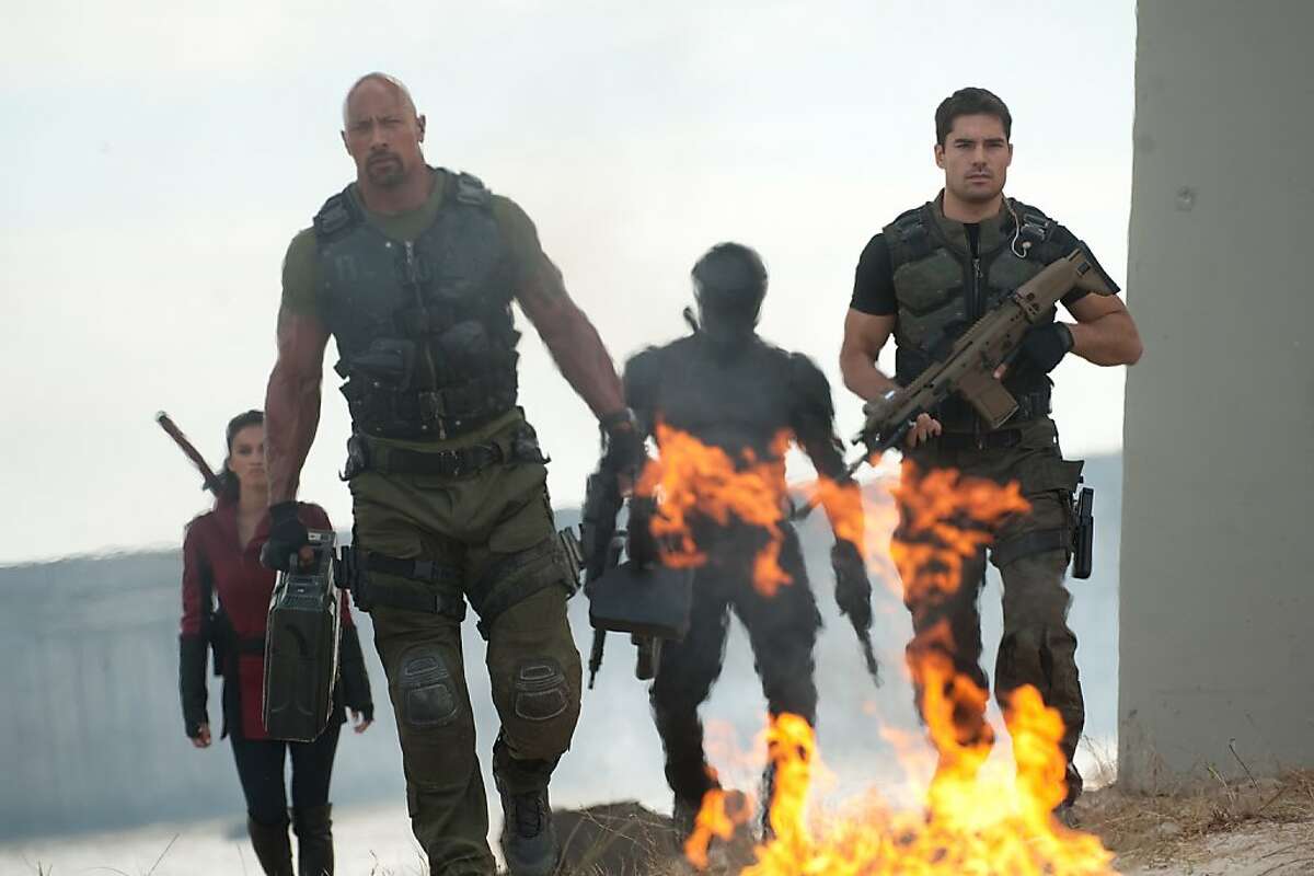 Left to right: Elodie Yung plays Jinx, Dwayne Johnson plays Roadblock, Ray Park plays Snake Eyes, and D.J. Cotrona plays Flint in G.I. JOE: RETALIATION, from Paramount Pictures, MGM, and Skydance Productions. GR-17007