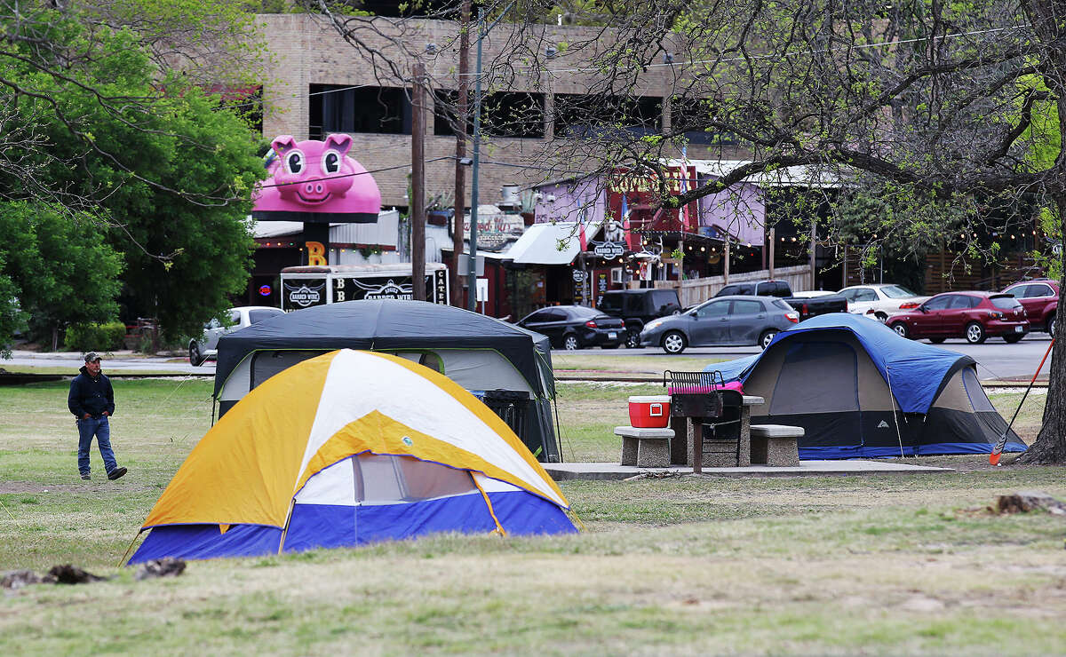Camp sites start to pop up around Brackenridge Park on Thursday, Mar. 28, 2013.