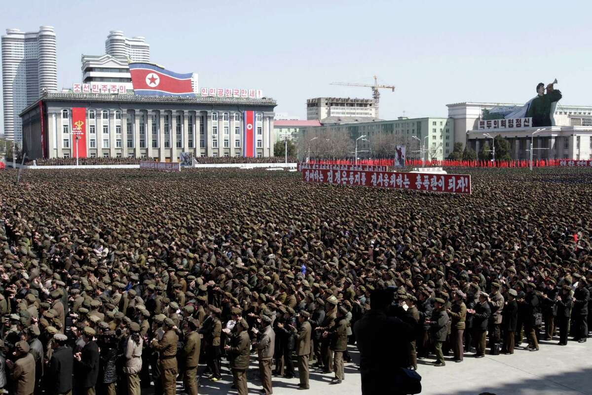 Tens of thousands of North Koreans gather at a rally at Kim Il Sung Square in downtown Pyongyang in support of their leader Kim Jong Un's call to arms.