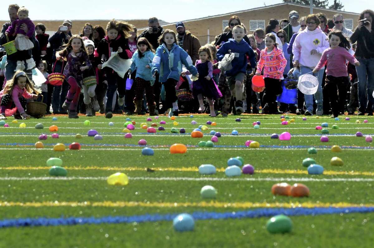 Children a parents break from the start during the 5th Annual Great Schuylerville Egg Hunt on Saturday March 30, 2013 in Schuylerville, N.Y. (Michael P. Farrell/Times Union)