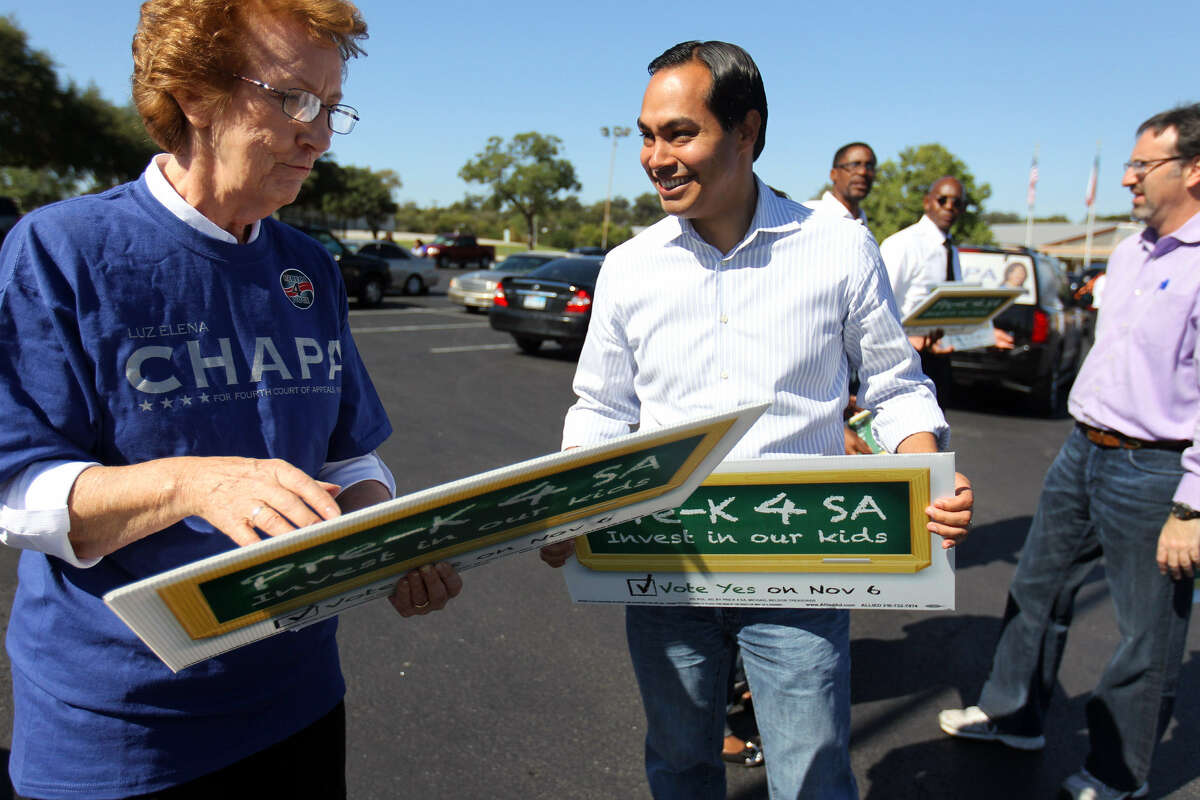 Mayor Julián Castro greets supporter Sister Miriam Mitchell during his successful campaign last fall for a tax hike to fund Pre-K 4 SA. Collection of the new tax starts Monday, and businesses are scrambling to set up the new rate on their systems .