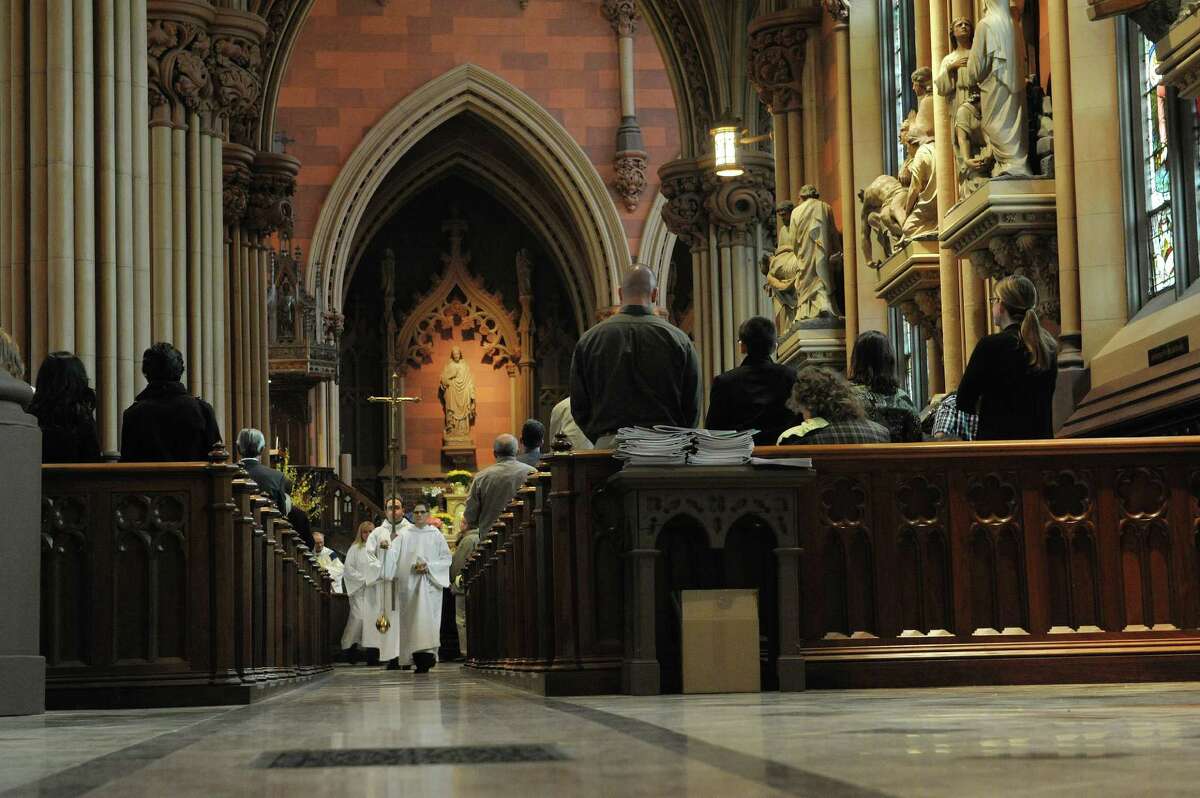 Incense is used as the procession winds its way through the aisles of the Cathedral of the Immaculate Conception during the Easter Sunday service on Sunday, March 31, 2013 in Albany, NY. (Paul Buckowski / Times Union)