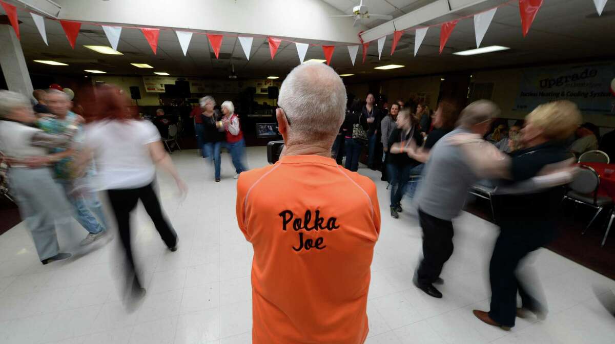 Polka Joe Trzeciak is surrounded by polka dancers during the Dyngus Day celebration April 1, 2013, at the Elks lodge in Rotterdam, N.Y. (Skip Dickstein/Times Union)