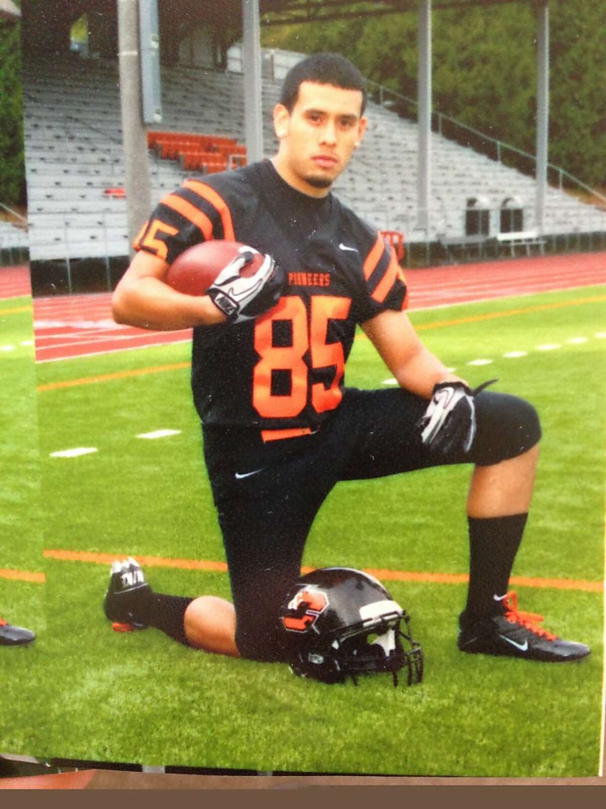Jacob Valdiviezo, 19, who was shot and killed in front of his Mission District home early Saturday, is shown here in his Lewis and Clark football uniform. He played wide receiver and was a sophomore at the college in Portland, Ore.