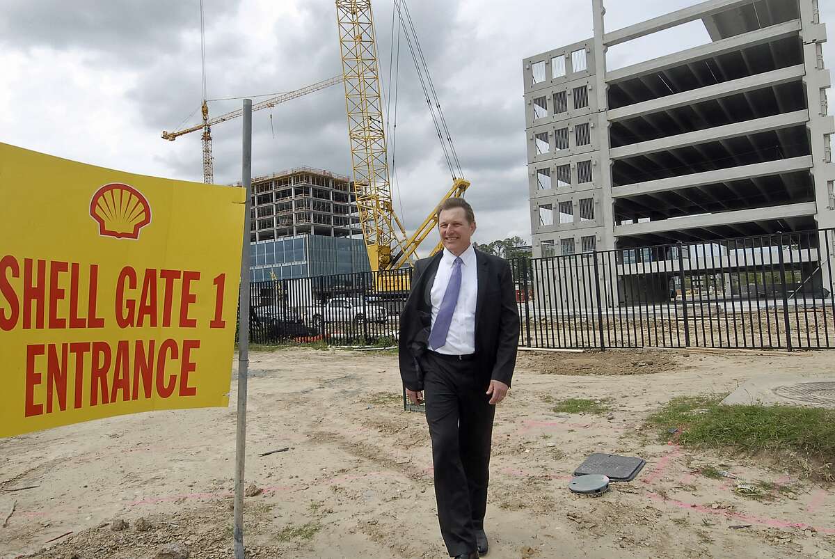 Energy Corridor District's Clark Martinson surveys construction by Shell to add buildings in the district. Other projects in the district include Trammel Crow Co.'s 20-story Energy Center Three and a new multifamily luxury residence.