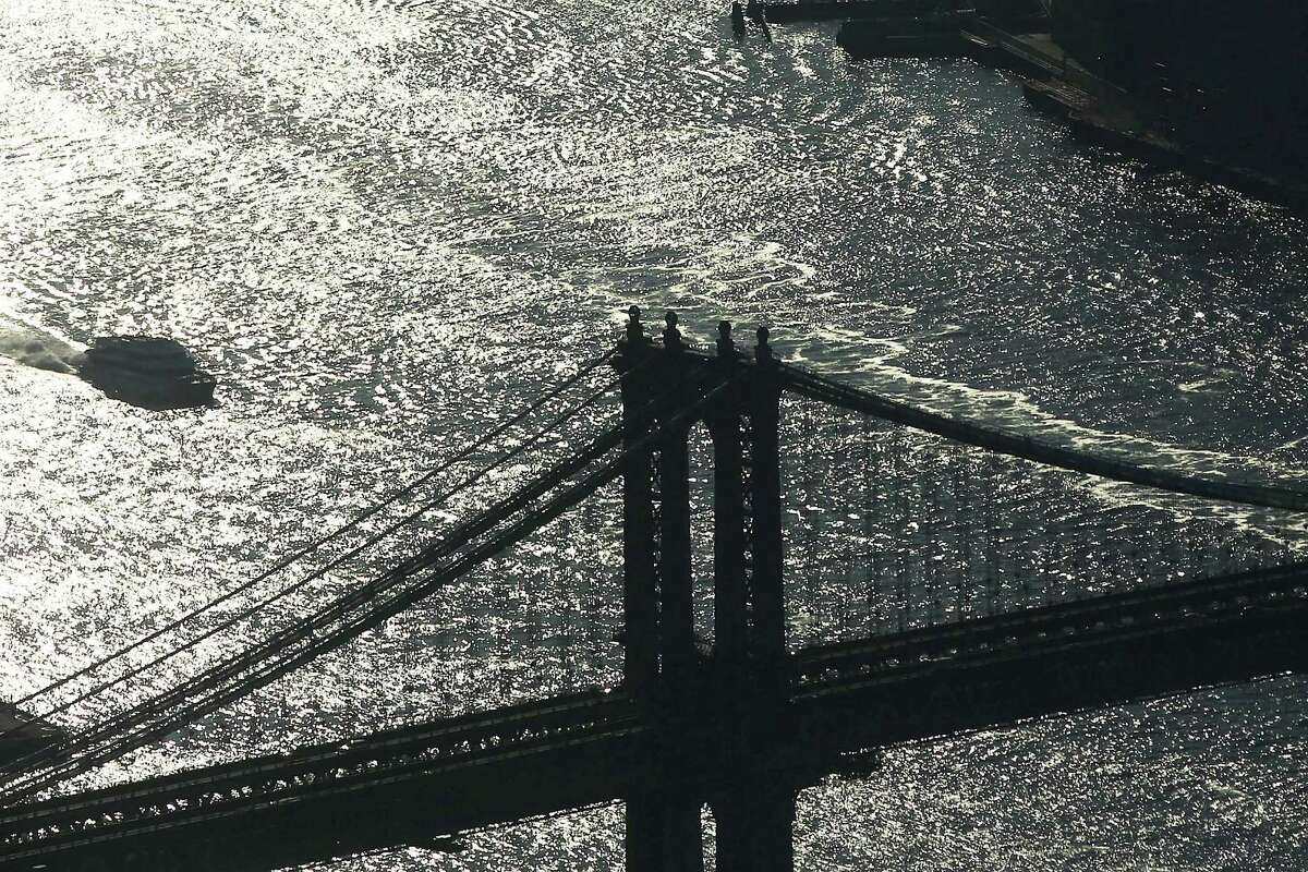 NEW YORK, NY - APRIL 02: The Manhattan Bridge is seen from the One World Observatory from the 100th floor of One World Trade Center at the Ground Zero site on April 2, 2013 in New York City. One World Observatory, which is situated more than 1,250 feet over lower Manhattan, will open to the public in 2015 and will include a pre-show theater, multiple spaces that allow for panoramas of the New York City region and numerous dining options. When completed, One World Trade Center will be the tallest building in the Western Hemisphere at 1776 feet.