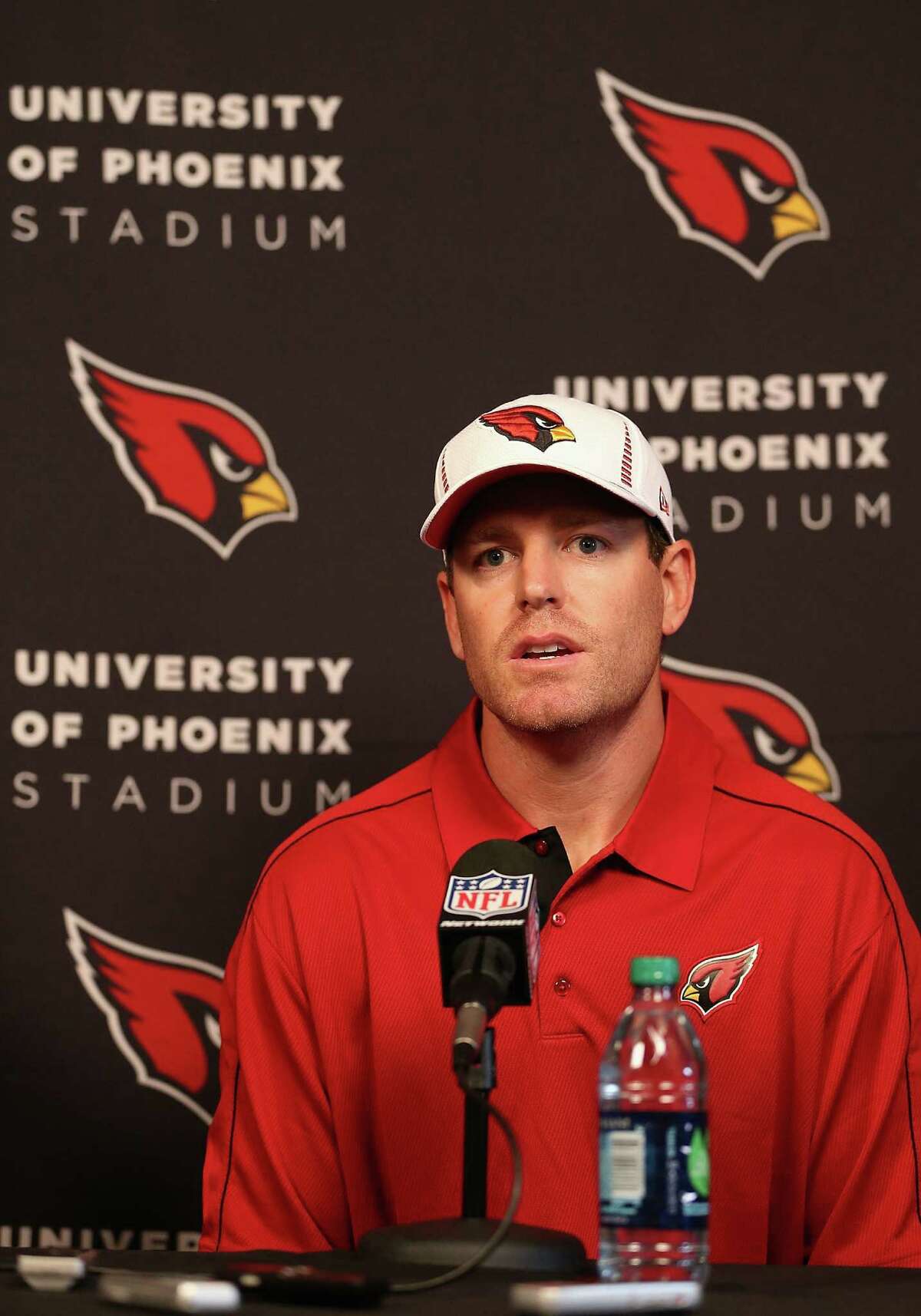 New Cardinals quarterback Carson Palmer speaks at a press conference to announce the move in Tempe, Ariz.