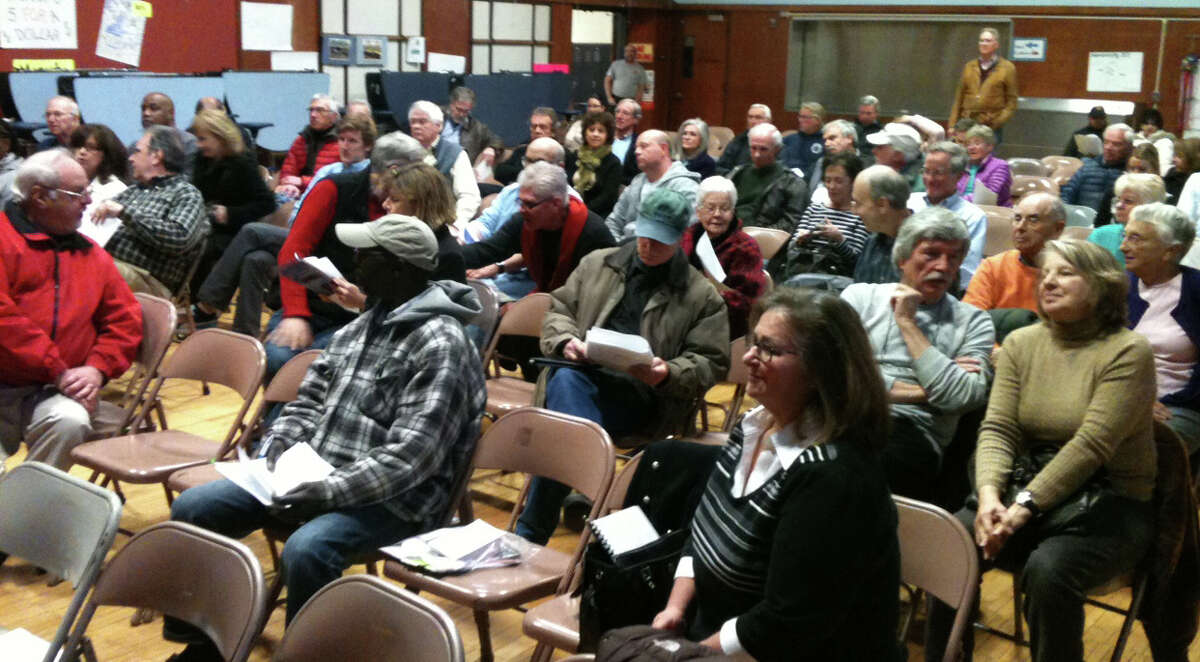 About 100 people attended U.S. Rep. Jim Himes' Town Hall-style meeting in Fairfield on Tuesday night. FAIRFIELD CITIZEN, CT 4/2/13