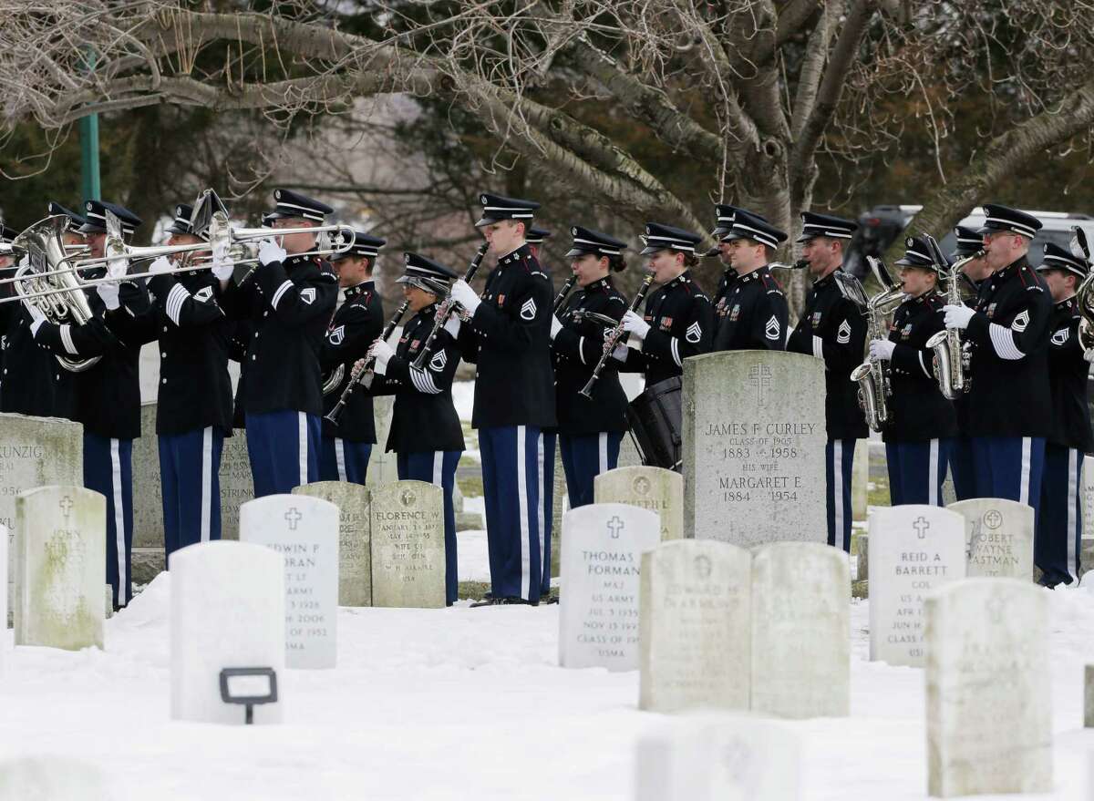 The U.S. Military Academy Band performs during a burial service at the West Point Cemetery on Friday, March 22, 2013, in West Point, N.Y. The service was for Maj. Gen. Robert Strong and wife Virginia Strong. Graves of soldiers from every U.S. war make this small plot of the land the most hallowed ground on the nation's the most venerable military academy. And after 196 years and more than 8,000 souls, it's close to full.