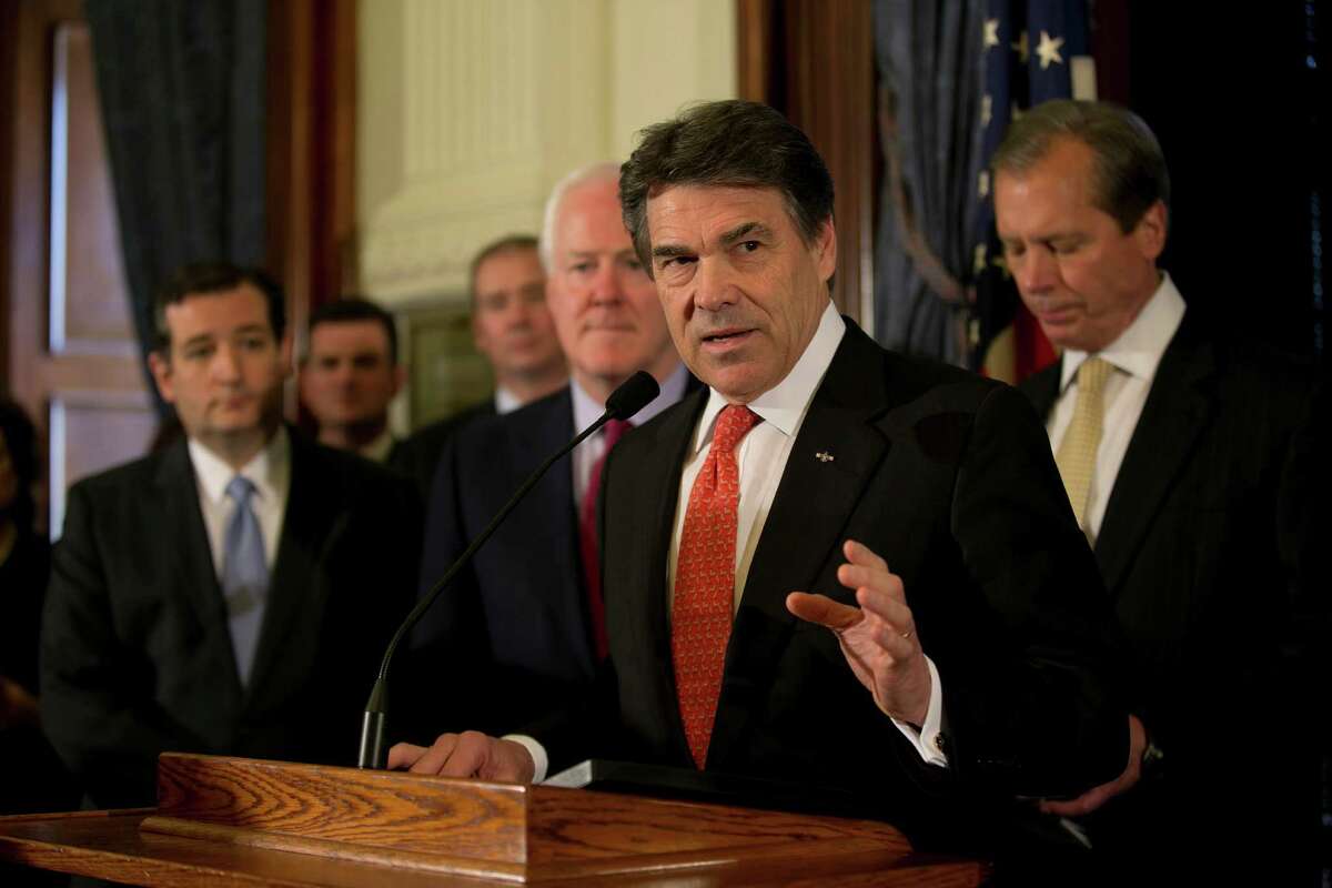 Gov. Rick Perry holds a news conference at the Capitol in Austin, Texas, on Monday, April 1, 2013, along with other Republican officials to announce that they believe that Medicaid is a broken system, and that expanding it under the Affordable Care Act is the wrong move for Texas. Shown, from left, are US Senators Ted Cruz and John Cornyn and Lt. Gov. David Dewhurst. (AP Photo/Austin American-Statesman, Deborah Cannon)