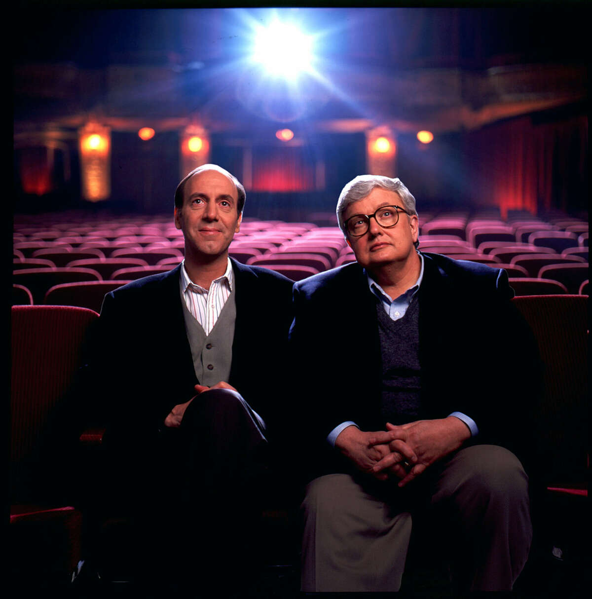 Roger Ebert (right) wrote in his 2011 memoir that Gene Siskel, who died in 1999, was “in my mind almost every day.”