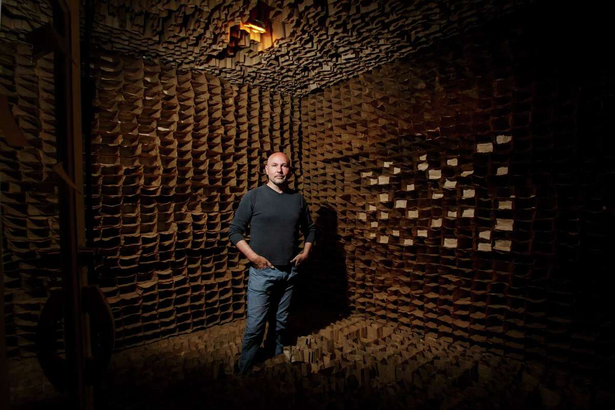 Houston Artist Nicola Parente stands inside his "Colony Collapse" installation at Spring Street Studios, Wednesday, March 27, 2013, in Houston. ( Michael Paulsen / Houston Chronicle )