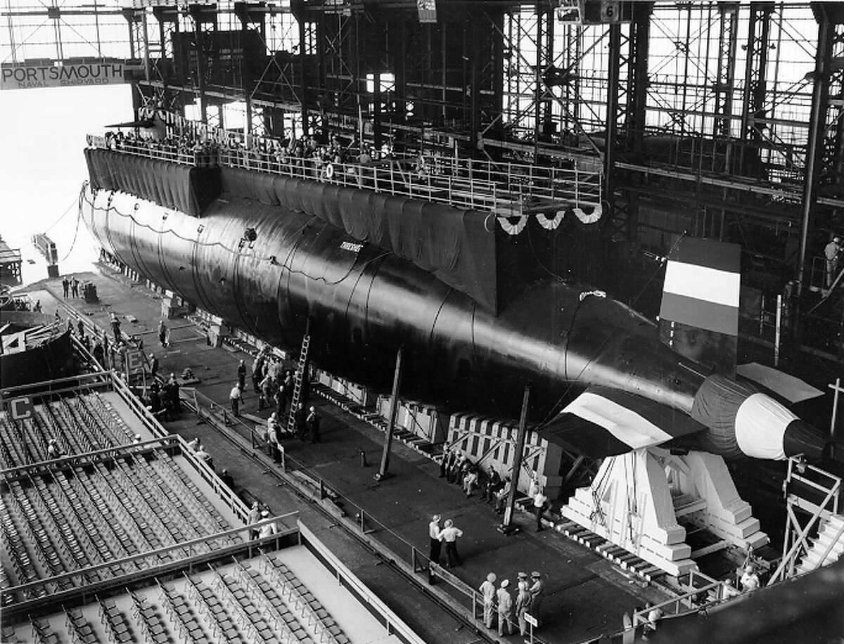 In this 1960 handout file photo provided by the U.S. Navy, the nuclear-powered submarine USS Thresher is prepared for launching at the Portsmouth Naval Shipyard in Kittery, Maine. Fifty years ago, 129 men lost their lives when the sub sank during deep-dive testing.