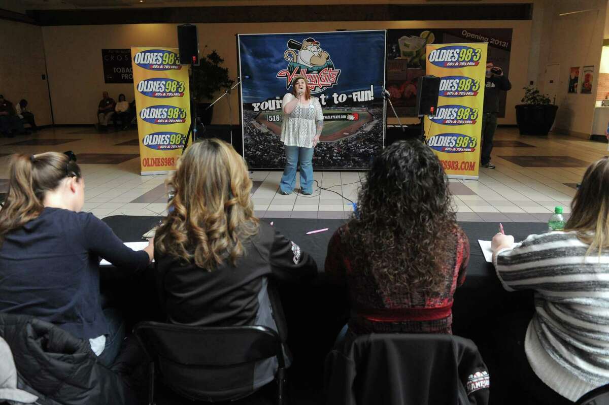 Lauren Kerr of Waterford competes in the 3rd Annual National Anthem tryouts hosted by Jaime Roberts from the Jaime in the Morning Show on Oldies 98.3, and Sammy Baseball from the ValleyCats at Crossgates Mall on Saturday April 6, 2013 in Guilderland, N.Y. The judging panel will select four finalists who will be videotaped singing their version of the National Anthem, and then be placed online for fans to vote on a winner. (Michael P. Farrell/Times Union)