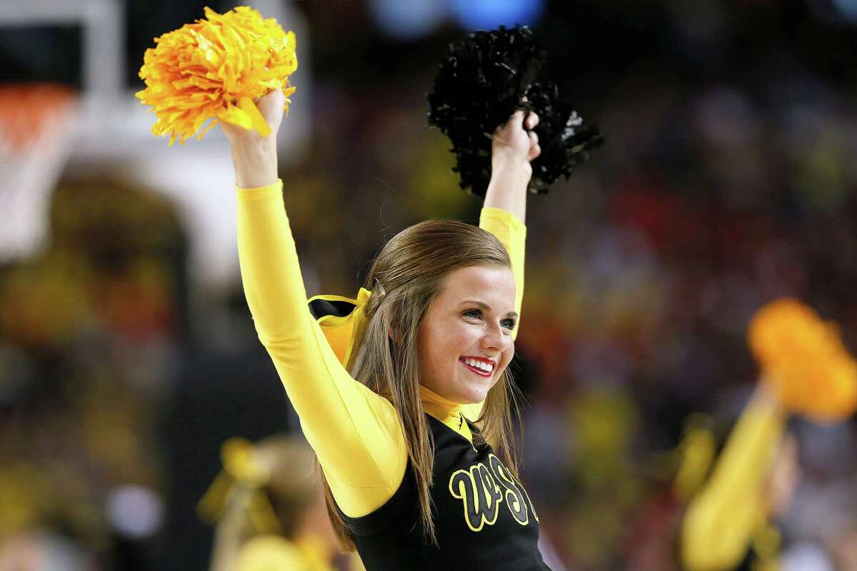 A Louisville cheerleader during the NCAA College Basketball game