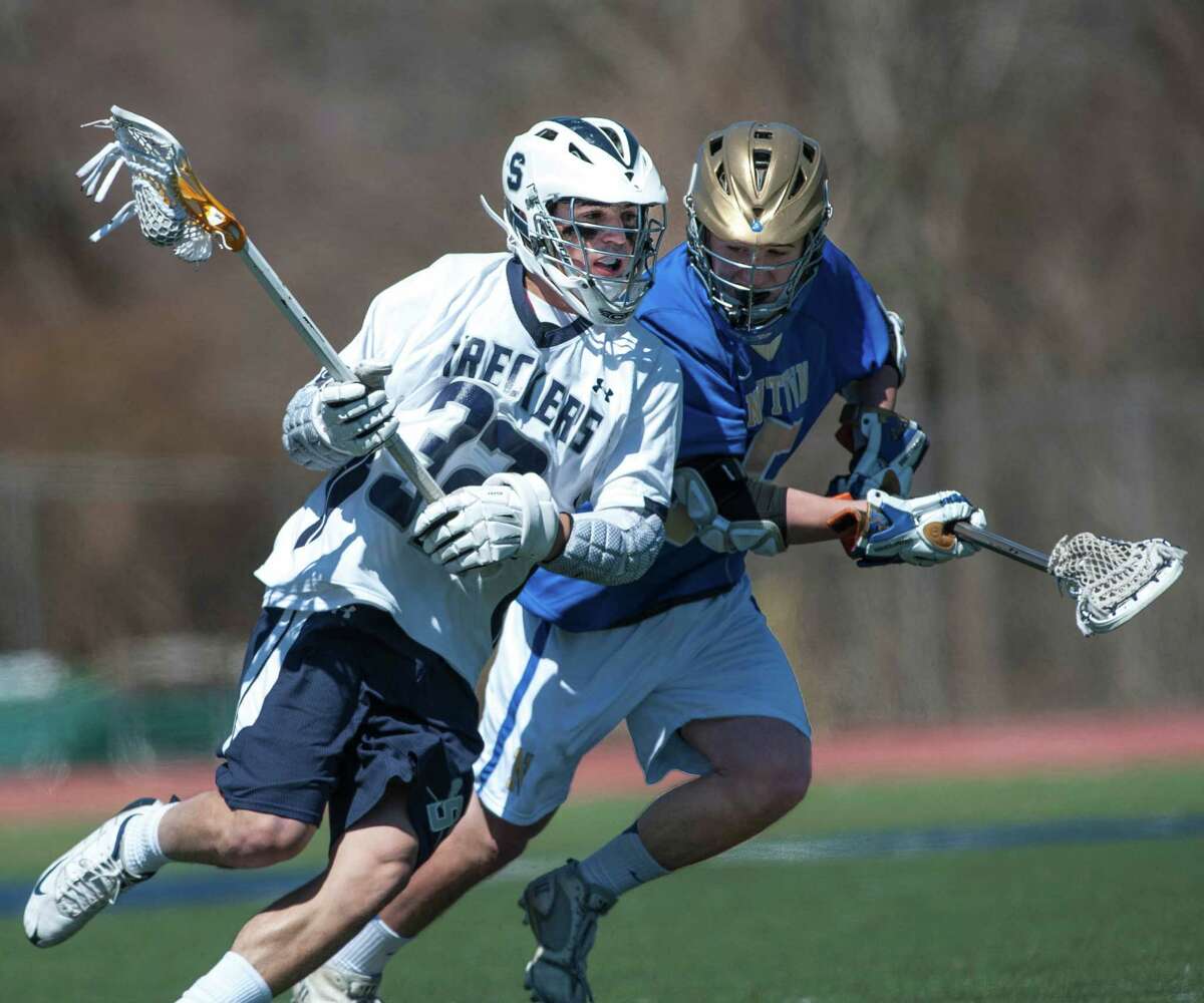 Staples boys lacrosse rolls past Newtown
