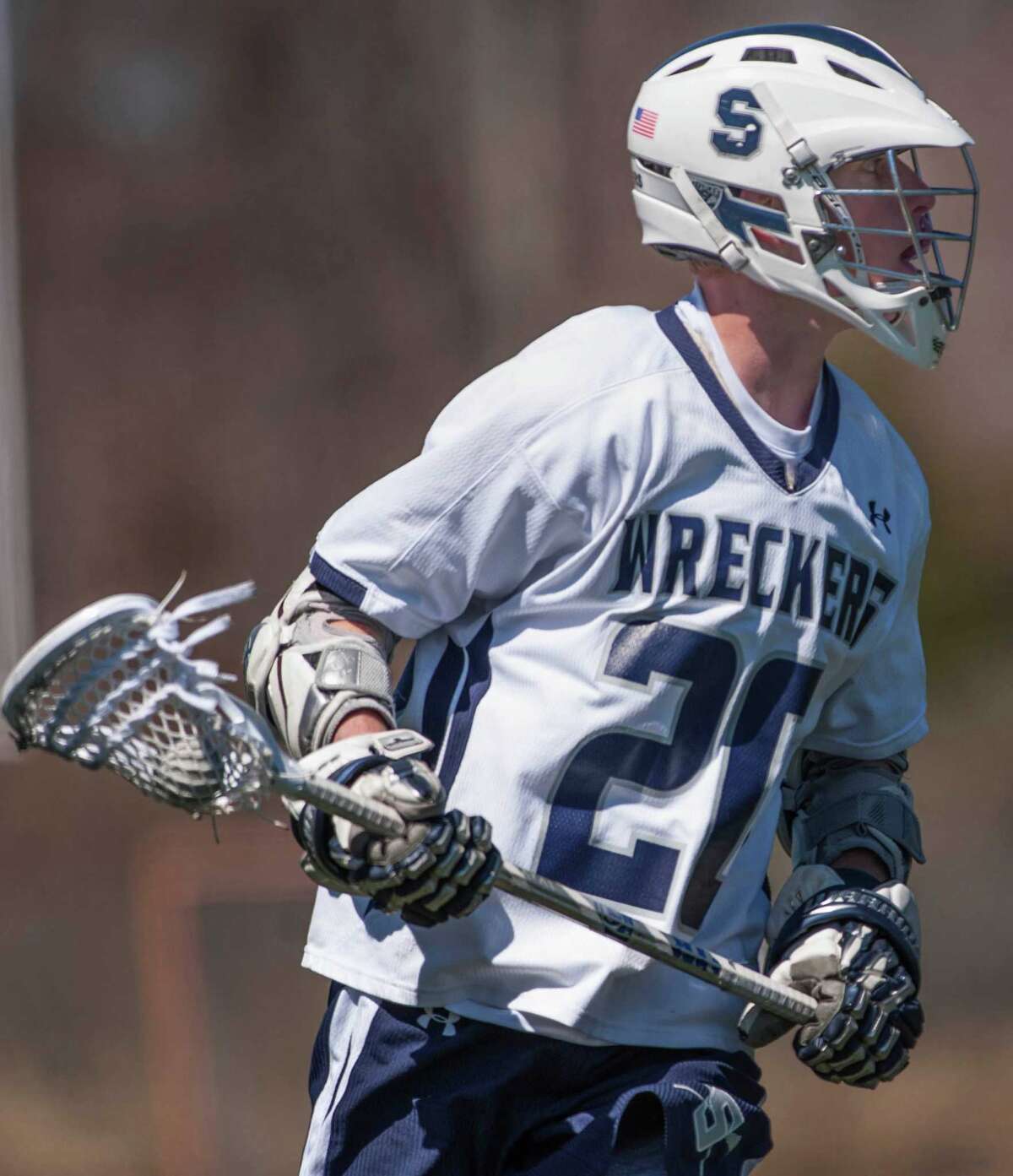 Staples boys lacrosse rolls past Newtown