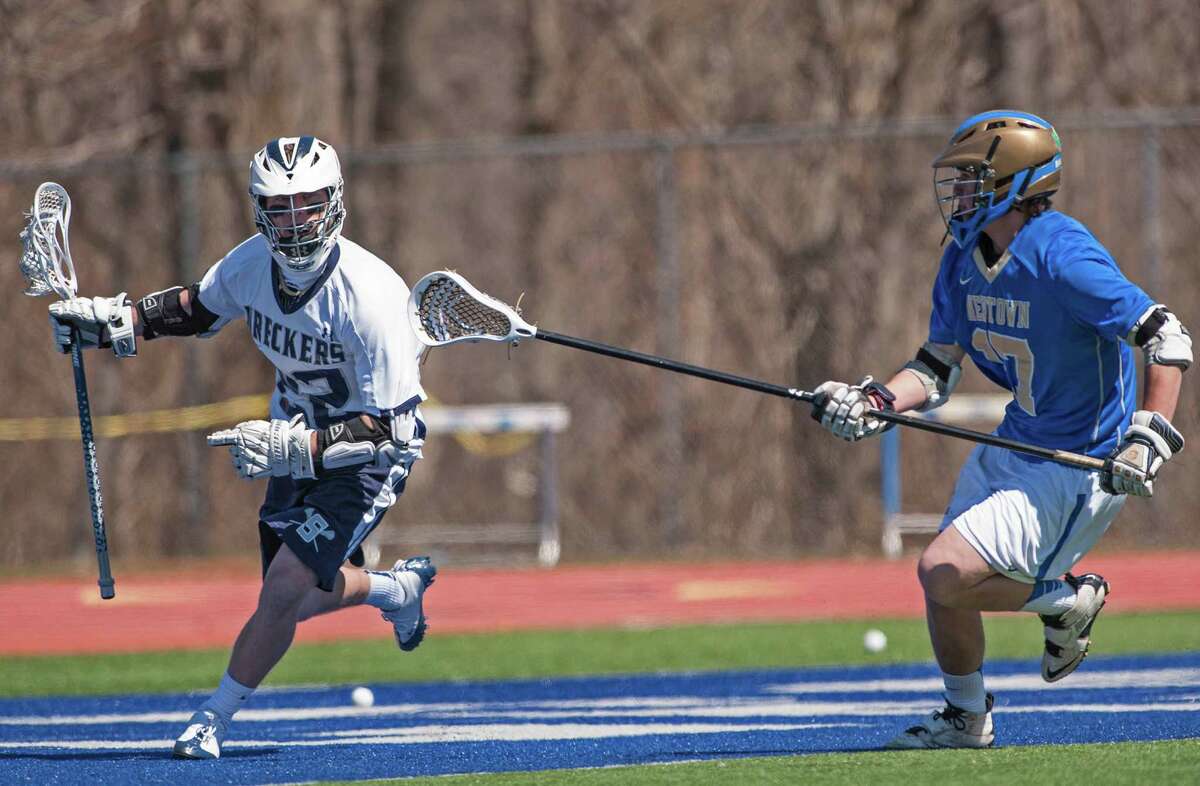 Staples boys lacrosse rolls past Newtown