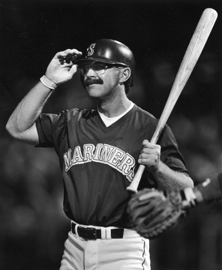 Seattle Mariners' Rickey Henderson is congratulated by teammates News  Photo - Getty Images