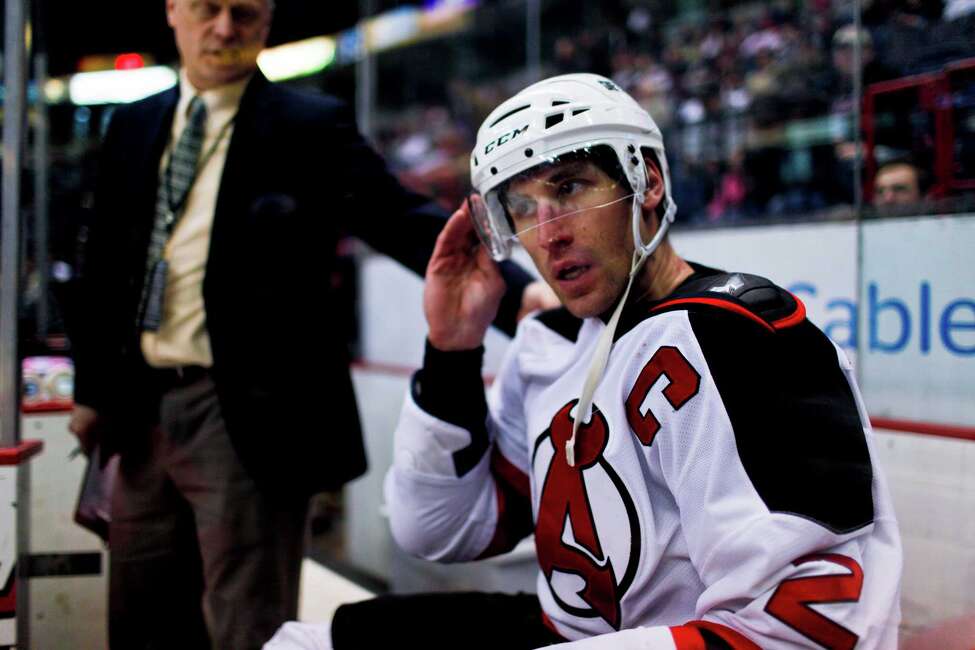 Albany Devil's Jay Leach (2) , gets sent to the penalty box after a fight with Rochester American's Alex Biega (4) during their game on Sunday, April 7, 2012 at the Times Union Center in Albany, N.Y. (Dan Little/ Special to the Times Union)