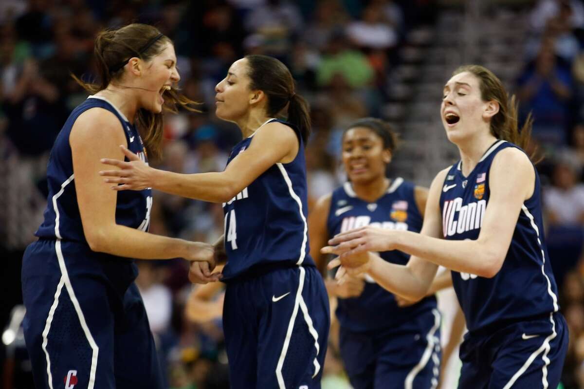 NEW ORLEANS, LA - APRIL 07: Members of the Connecticut Huskies react during the game against the Notre Dame Fighting Irish during the National Semifinal game of the 2013 NCAA Division I Women's Basketball Championship at the New Orleans Arena on April 7, 2013 in New Orleans, Louisiana. (Photo by Chris Graythen/Getty Images)