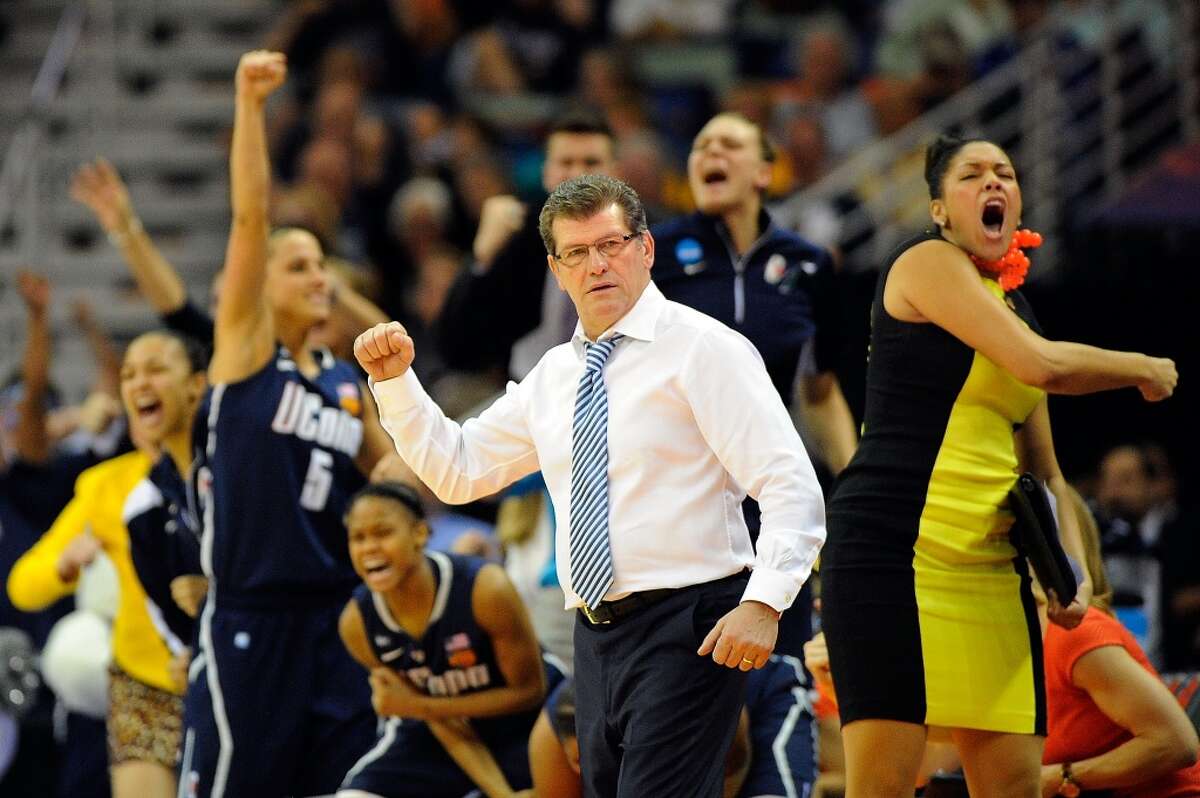 NEW ORLEANS, LA - APRIL 07: Geno Auriemma, head coach of the Connecticut Huskies reacts to a three point shot against the Notre Dame Fighting Irish during the National Semifinal game of the 2013 NCAA Division I Women's Basketball Championship at New Orleans Arena on April 7, 2013 in New Orleans, Louisiana. (Photo by Stacy Revere/Getty Images)