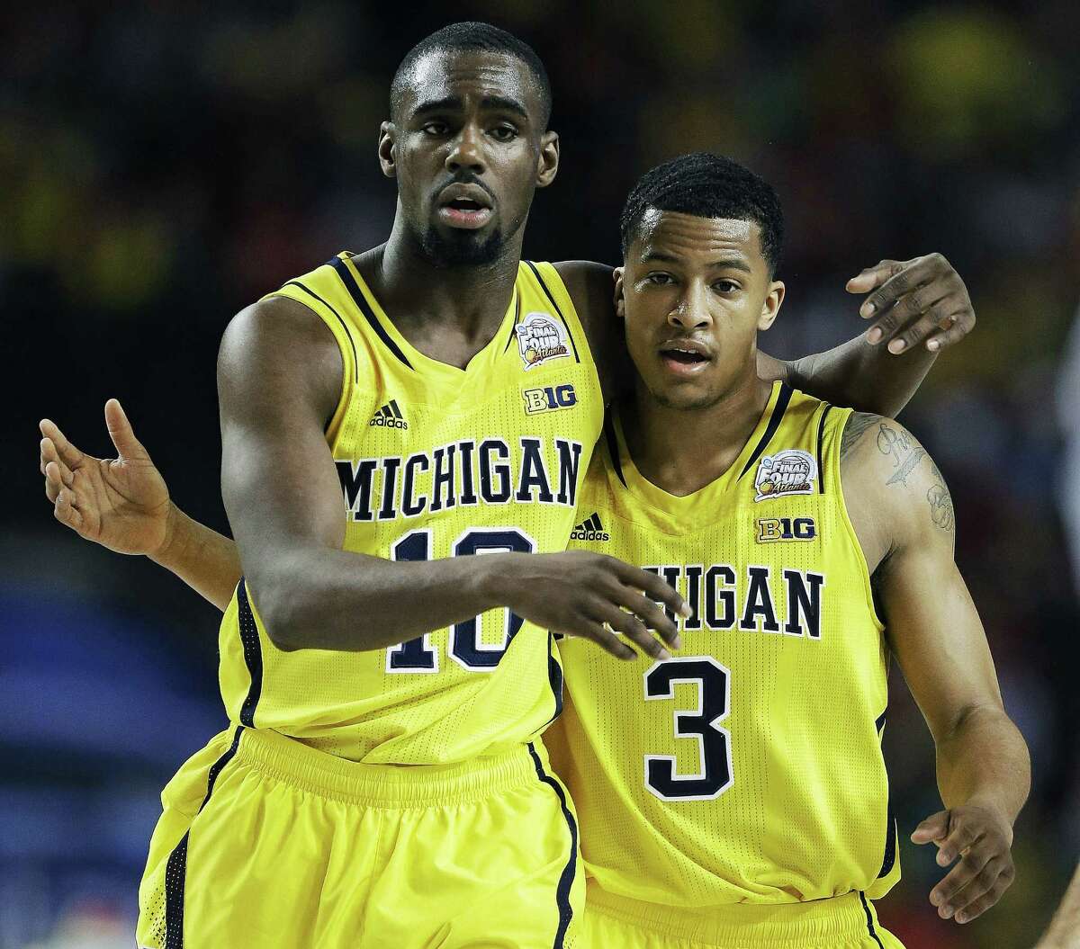 Tim Hardaway Jr. (left) and Trey Burke have Michigan close to its first title since 1989.
