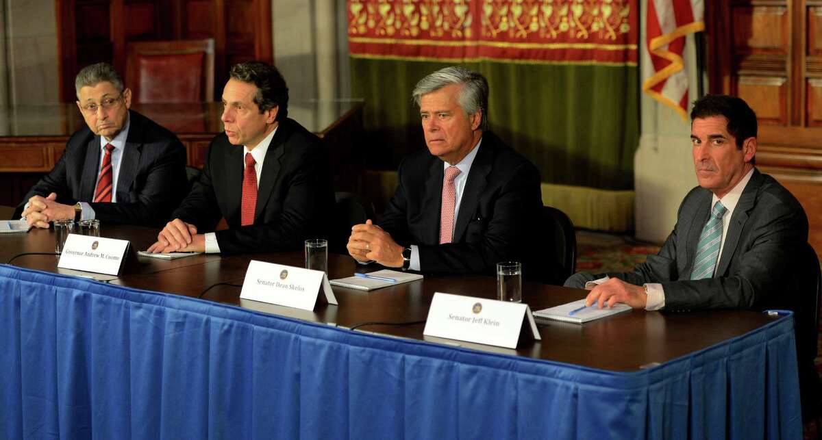 Governor Andrew Cuomo, second from left, was joined by Shelly Silver, speaker of the Assembly, left, Dean Skelos, republican conference leader, second from right, and Jeffrey Klein, independent democratic conference leader, right, Wednesday morning, Jan. 30, 2013, for a leaders' meeting in the Red Room of the State Capitol in Albany, N.Y. (Skip Dickstein/Times Union)